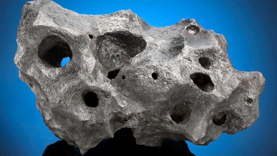A 70-lb. iron meteorite found in the Arizona desert was bought at an online auction for $237,500.