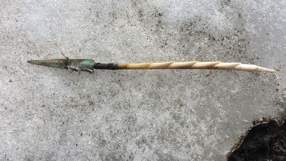 Close up of barbed antler arrow point with copper end blade shortly after it was removed from the ice. (Government of Yukon photo)