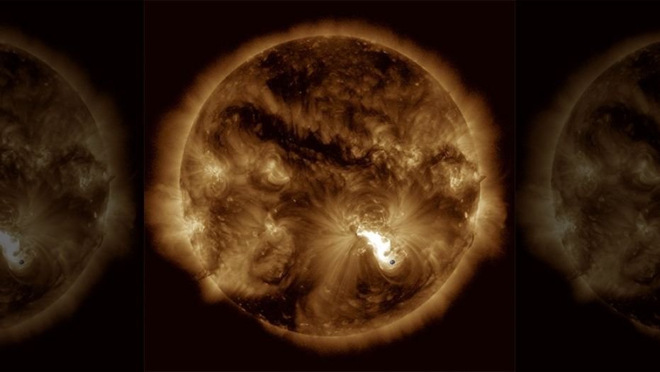 Major eruption of Oct. 24, 2014, observed by the AIA instrument of the NASA Solar Dynamics Observatory mission. Earth was added for scale.