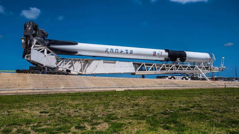 SpaceX's first Falcon 9 Block 5 rocket rolls to its launch pad at NASA's Kennedy Space Center in Florida.