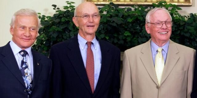 In this July 20, 2009, photo, Buzz Aldrin, left, Michael Collins, center, and Neil Armstrong stand in the Oval Office at the White House in Washington, on the 40th anniversary of the Apollo 11 moon landing.