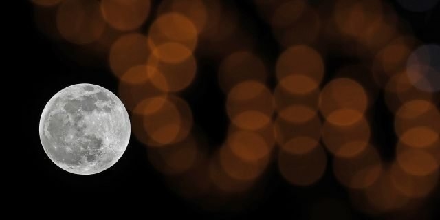 The Moon is seen during partial lunar eclipse over Istanbul, Turkey on January 10, 2020. (Photo by Isa Terli/Anadolu Agency via Getty Images)