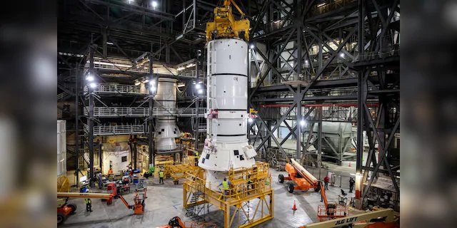 The aft segments of the Space Launch System solid rocket boosters for the Artemis I mission prepare to move from high bay 4 inside NASA's Vehicle Assembly Building (VAB) at Kennedy Space Center in Florida for stacking on the mobile launcher inside high bay 3.